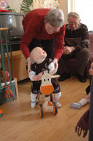 Caroline op de nieuwe loopfiets