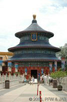 The three-tiered, circular Hall of Prayer for Good Harvest is a one-half scale reproduction of its counterpart inside the Temple of Heaven complex near Beijing.  Many of its architectural details, both inside and out, have important significance to the Chinese people.  Inside the hall, there are 12 outer columns supporting the roof.  They represent the 12 months of the year and the 12-year cycle of the Chinese calendar.  Closer to the center of the room are 4 columns representing the four seasons.  These columns support a beam, representing Earth, which is topped by a round beam, signifying Heaven.