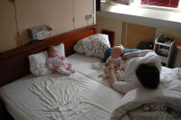 3 ladies on the bed