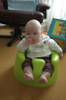 Alexandra in the Bumbo (a special chair)