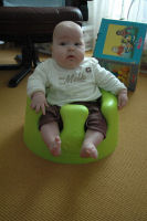 Alexandra in the Bumbo (a special chair)