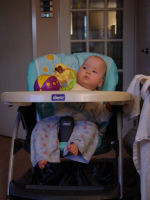 Alexandra in her highchair