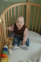 Alexandra sitting in her bed