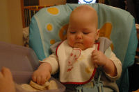 Alexandra eats a rice cracker