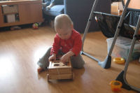 Caroline is playing with the blocks