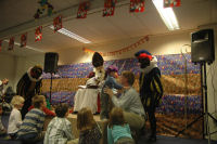 Alexandra with Sinterklaas and his assistant