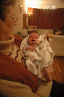 Grandma is holding Madeleine