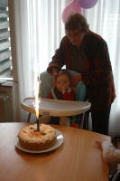 Madeleine with her cake